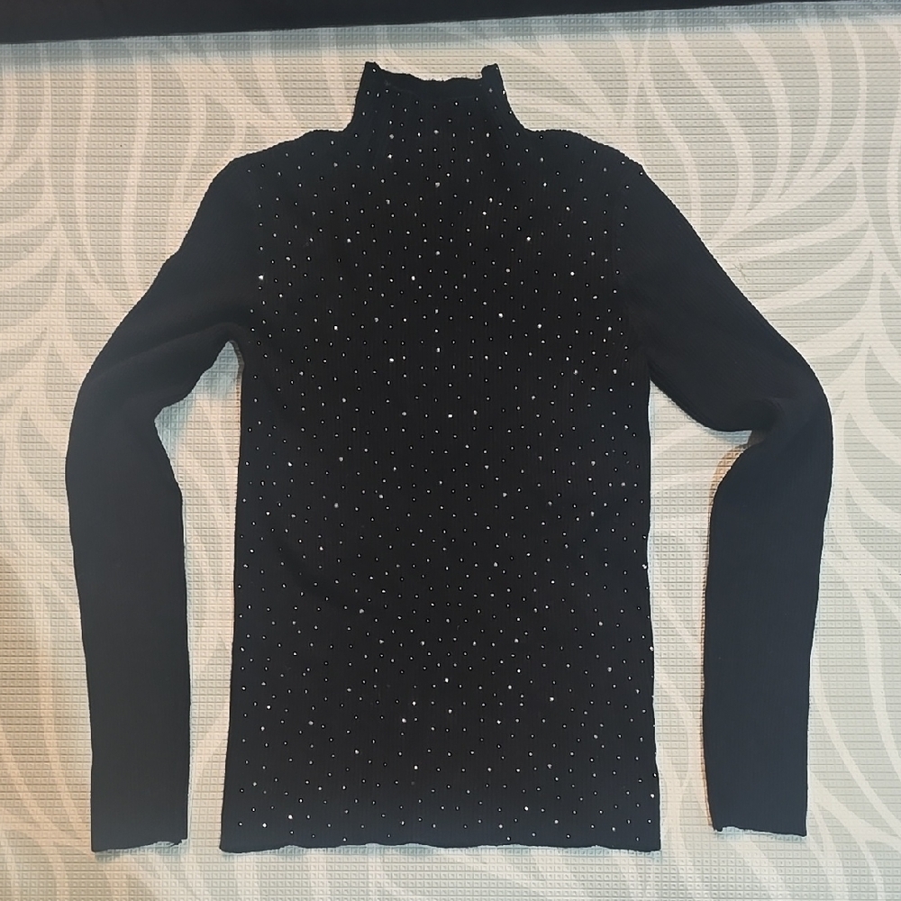 Black Turtleneck Sweater with Silver Accents